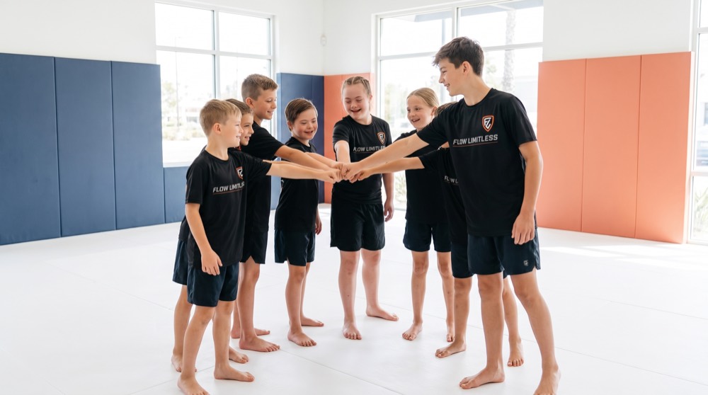 Young students and their coach smiling together, sharing a moment of confidence and connection